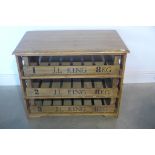 A pine kitchen or hall three tier storage unit, with sliding trays, 67cm tall x 86cm x 51cm