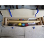 A four person croquet set