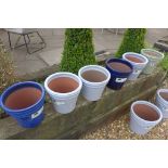 Six small glazed garden pots, 19cm high