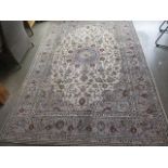 A hand knotted woollen Kashan rug - 300cm x 192cm