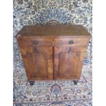 A Regency mahogany cabinet with a frieze drawer above two doors - 77cm tall x 72cm x 35cm