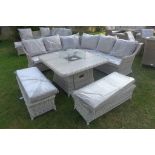 A Bramblecrest Ascot square casual dining table set with fire pit and ceramic top with two