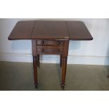 A Victorian mahogany two drawer drop leaf work table - 70cm tall x 81cm x 54cm extended