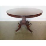 A superb quality Regency rosewood breakfast/centre table, veneered on solid mahogany and supported