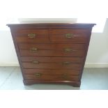 A late Victorian walnut two over three chest of drawers, 109cm tall x 107cm x 50cm