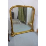 A Victorian style gilt over mantle mirror with acanthus scroll decoration, 137cm tall x 136cm