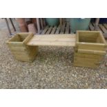 A wooden garden seat, with two side planters, 170cm wide
