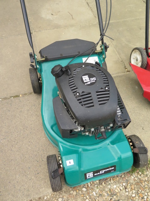 A petrol lawn mower PB35 Power Base, with a grass box, in working order