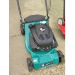 A petrol lawn mower PB35 Power Base, with a grass box, in working order