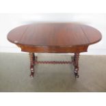A Victorian oval shaped top sofa table of small proportions with frieze drawer and all supported