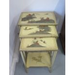 A nest of three chinoiserie side tables