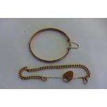 A 9ct bangle and a 9ct bracelet, approx 18.7 grams, generally good