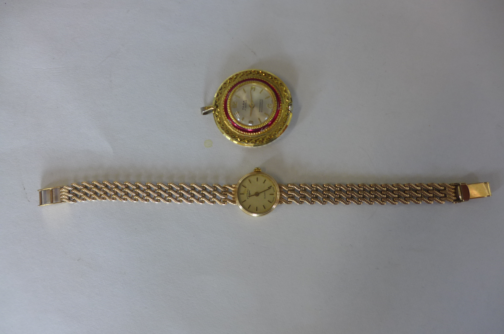 A Rotary 9ct yellow gold ladies bracelet wristwatch, approx 13.5 grams, working and a gilt metal