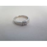 An 18ct white gold solitaire diamond ring, approx 0.20ct, ring size M, approx 4.6 grams, diamond