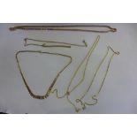 Six 9ct gold necklaces, approx 21.5 grams