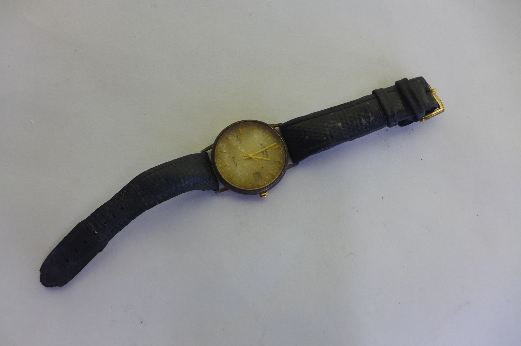 A 9ct Rotary Elite wristwatch on a leather strap not working, total weight approx 33 grams