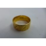 A 22ct yellow gold band, size M/N approx 7.1 grams