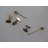 A pair of 9ct gold cufflinks, approx 5.1 grams, together with a 9ct gold hairpin, approx 1.8 grams