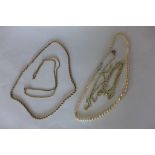 Two 9ct yellow gold chains, approx 12.5 grams, two gilt plated chains, and imitation pearls