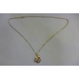 A 14ct yellow gold ship pendant, on a 14ct chain, approx 4.5 grams, generally good