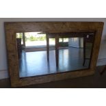 A rustic pine mirror 130cm x 84cm