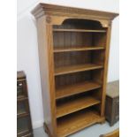 A good quality modern oak bookcase with five adjustable shelves in very good condition, 200cm high x