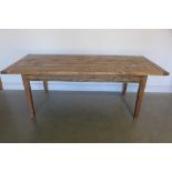 A rustic pine kitchen table, 74cm H x 204cm x 86cm