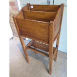 An oak Arts and Crafts magazine rack, 45cm wide x 92cm high