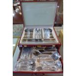 A Harrier stainless steel gilt trimmed canteen of cutlery, 12 setting, minor usage