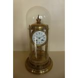 A brass Portico or Bandstand clock under dome, striking movement, height 42cm, running in auction