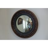 An early 20th century round convex hall mirror - 50cm diameter