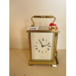 A brass cased carriage clock, 8 day movement, the dial marked Shortland Bowen England, 16cm tall, in