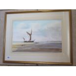 Ian Russell watercolour, Barge at low tide, entitled Ebb Tide Norfolk, in a gilt frame, 55x70cm - in