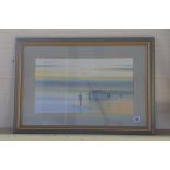 A watercolour of fisherman on Brighton Beach by Nick Grant, 1988 - in a gilt high lighted frame,