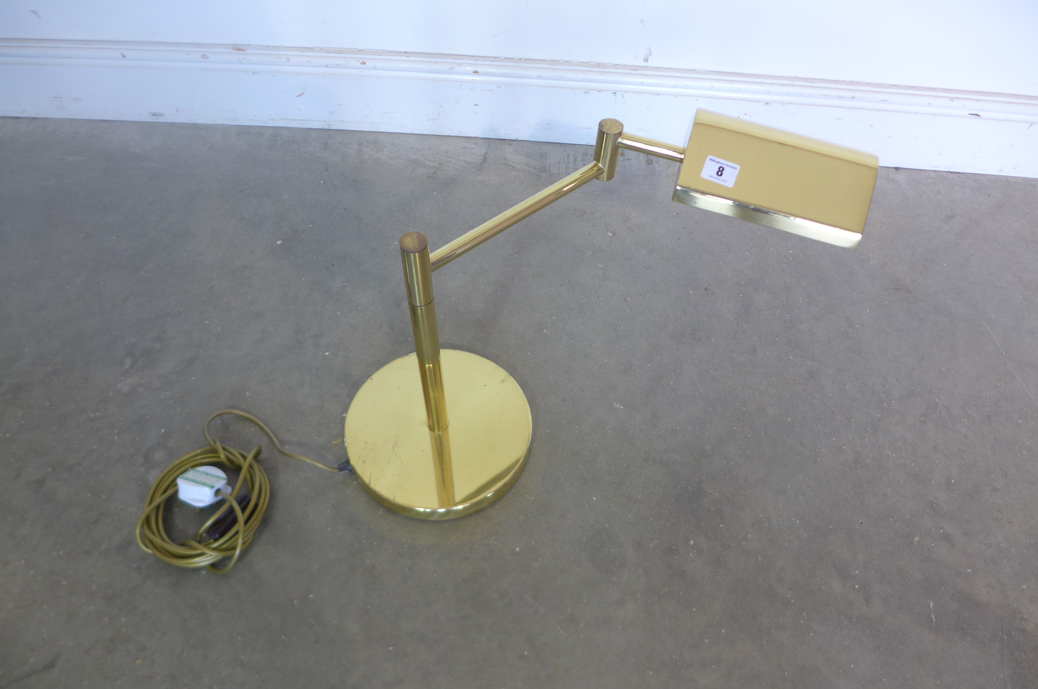 An adjustable brass desk lamp, in working order, and PAT tested