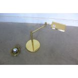 An adjustable brass desk lamp, in working order, and PAT tested