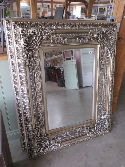 A modern ornate mirror measuring 94x123cm - can be hung either way