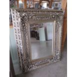 A modern ornate mirror measuring 94x123cm - can be hung either way