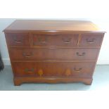 A 20th century reproduction yew wood chest of three over two drawers, 78cm H x 107cm x 49cm - in