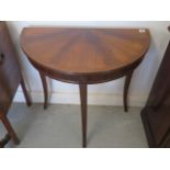 A Regency style Demi Lune mahogany side table