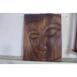 A carved Buddha wooden panel, 77 x 59cm