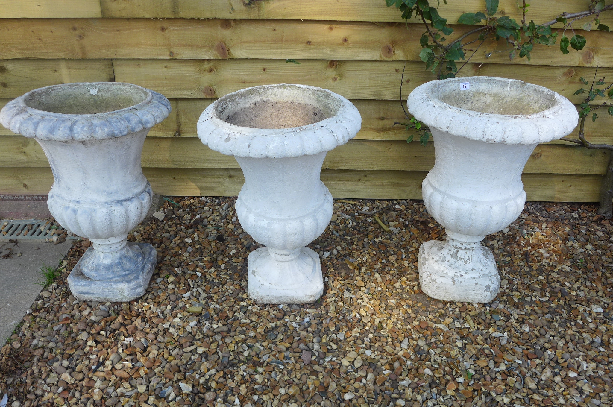 Three stone effect painted garden urns, 68cm tall, 46cm diameter