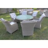 A Bramblecrest Oakridge 140cm round dining table and six high back chairs, ex-display
