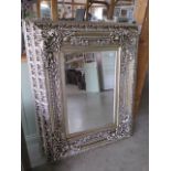 A modern ornate mirror measuring 94x123cm - can be hung either way