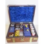 A 19th century brass bound walnut sewing box with contents