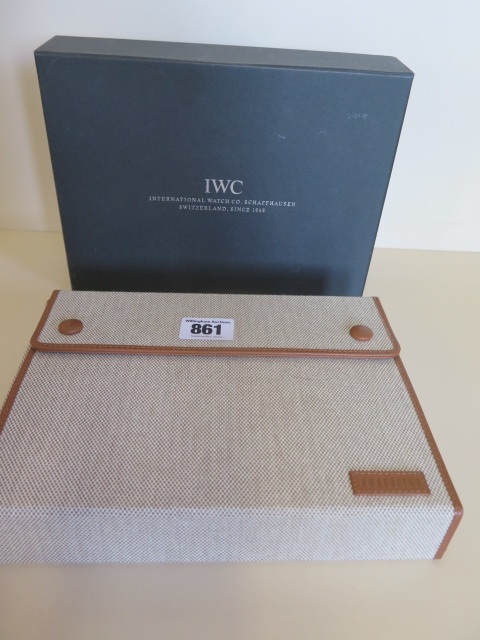 An IWC travelling games set containing cards, poker dice etc, in original presentation case by