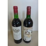 A bottle of 1979 Chateau de Pez Saint Estephe red wine - level to base of neck, and a bottle