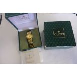 A ladies Gucci wristwatch, gold plated case and strap, model 33200.2.L, serial no 0094370 with box