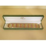 A 9ct tri-colour gold bracelet, 19cm long, approx 26 grams, in good condition