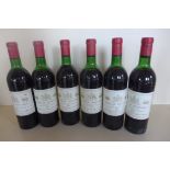 Six bottles of Chateau Moulinet Pomerol 1969 red wine, four with level to base of neck, two others